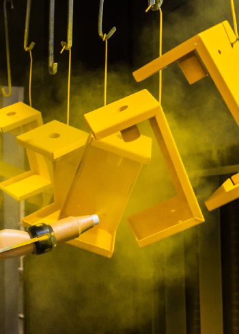 Powder coating finished steel components